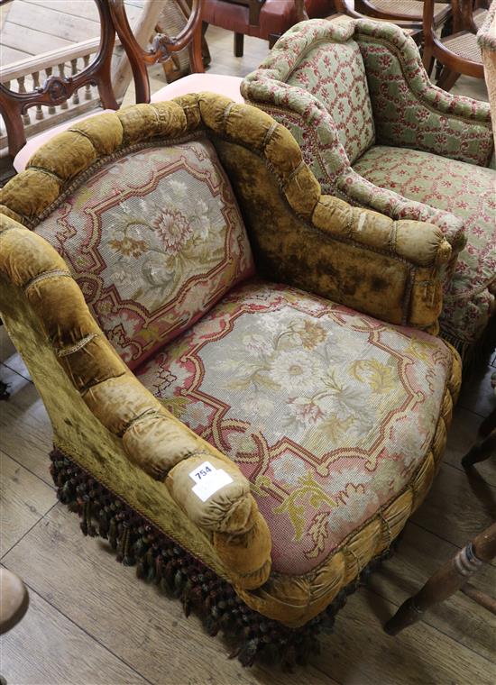 A pair of Victorian upholstered armchairs